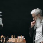 Ai Innovation - Elderly Man Thinking while Looking at a Chessboard