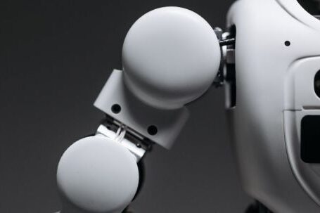 Ai Innovation - White Robot Toy in Close Up Photography