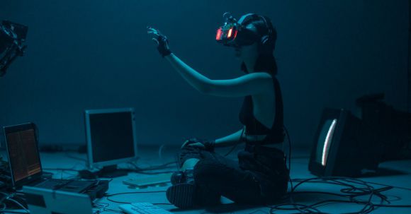 Ai Revolution - A Woman in a Tank Top Using a VR Headset